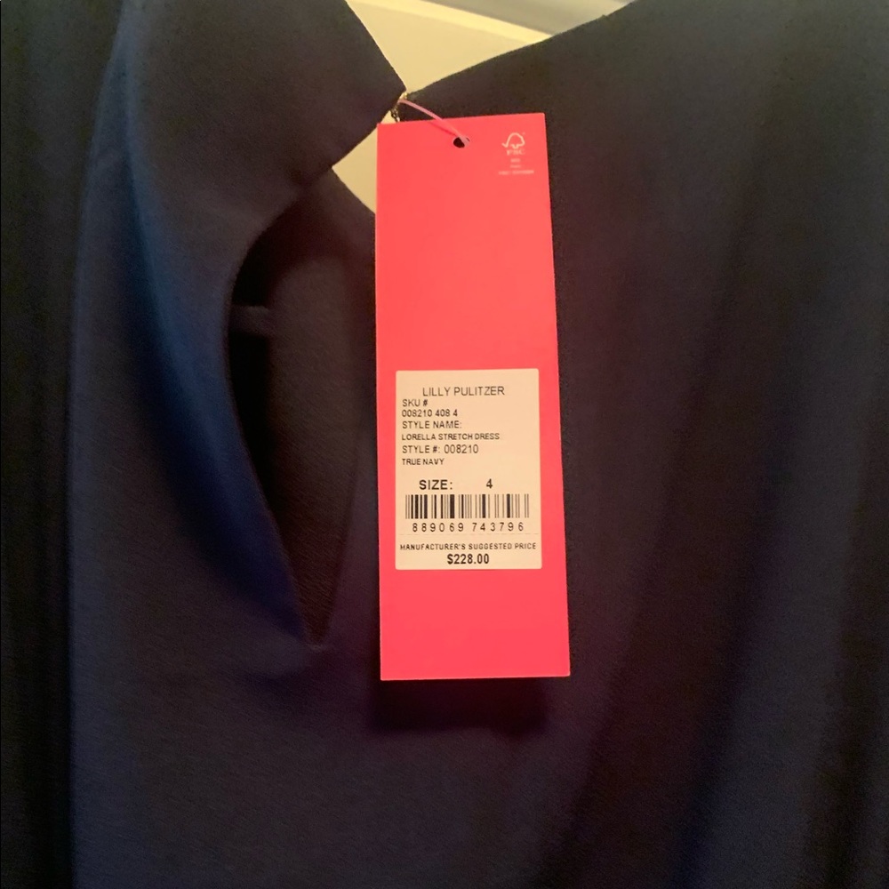 Lilli Pulitzer dress, New with tag. Size 4, dark navy color.
